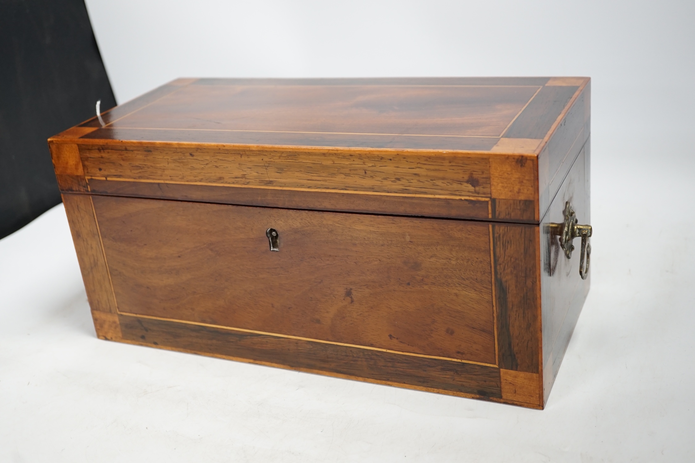 A George IV mahogany tea caddy, 33cm wide. Condition - good